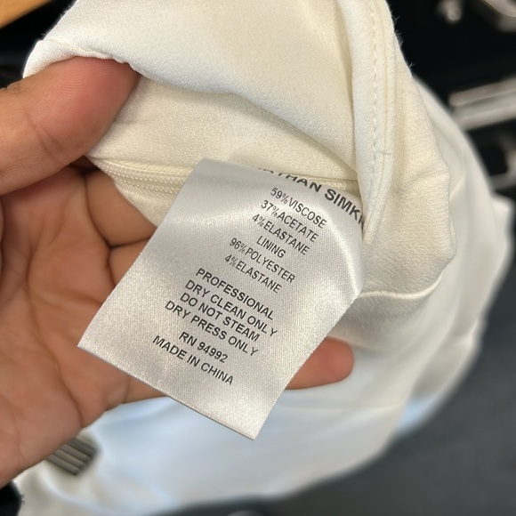 JONATHAN SIMKHAI Lace-up Cropped Crepe Flared Pants In Ivory - Picture 8 of 9